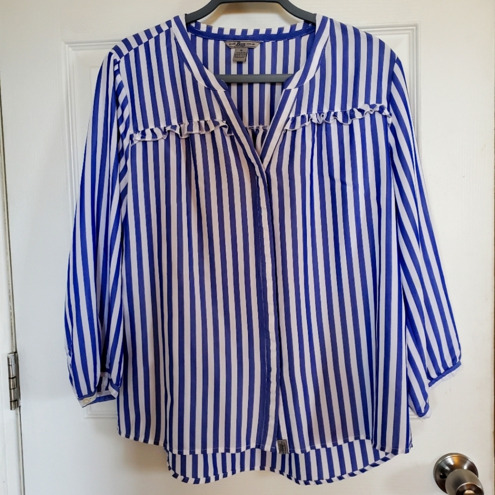 Vertical stripes shirt similar to one worn by Meghan Markle